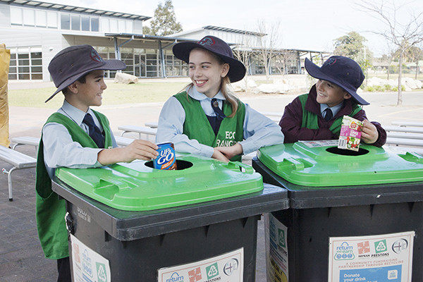 students at work as eco rangers for the school
